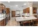 Spacious kitchen includes granite counters, stainless appliances, and a convenient breakfast bar area at 12972 W Kokopelli Dr, Peoria, AZ 85383