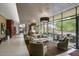 Welcoming lobby with comfortable seating, large windows, and views of outdoor greenery at 12972 W Kokopelli Dr, Peoria, AZ 85383