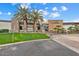 Exterior of V's Taproom featuring palm trees, stone accents, and well-maintained landscaping at 12972 W Kokopelli Dr, Peoria, AZ 85383