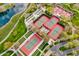 Aerial shot of multiple tennis courts and a pond, all surrounded by green landscaping at 12972 W Kokopelli Dr, Peoria, AZ 85383