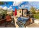 Outdoor community area featuring a built-in grill and comfortable seating, great for neighborhood get togethers at 13700 N Fountain Hills Blvd # 155, Fountain Hills, AZ 85268