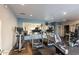 Community gym featuring modern equipment, including treadmills and weight machines, set against blue accent walls at 13700 N Fountain Hills Blvd # 155, Fountain Hills, AZ 85268