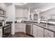Kitchen with sleek appliances and counter space, offering a functional and stylish cooking area in Four Peaks condo at 13700 N Fountain Hills Blvd # 155, Fountain Hills, AZ 85268