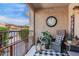 Cozy porch with a large clock, outdoor seating, and decorative elements, perfect for relaxing outdoors at 13700 N Fountain Hills Blvd # 155, Fountain Hills, AZ 85268