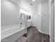Bright bathroom featuring bathtub and double sink vanity at 14000 N 94Th St # 1008, Scottsdale, AZ 85260