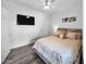 Bedroom with a TV and neutral-toned bedding at 14000 N 94Th St # 1008, Scottsdale, AZ 85260