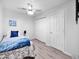 Cozy bedroom featuring plush bedding, ceiling fan, and ample closet space at 14000 N 94Th St # 1008, Scottsdale, AZ 85260