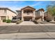 Two-story home with desert landscaping and a convenient two-car garage at 14000 N 94Th St # 1008, Scottsdale, AZ 85260