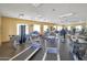 Bright community gym featuring treadmills, stationary bikes, and weight machines at 14000 N 94Th St # 1008, Scottsdale, AZ 85260