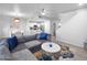 Open-concept living room flows into the kitchen, creating an inviting and airy space at 14000 N 94Th St # 1008, Scottsdale, AZ 85260