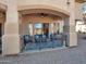 Inviting covered patio with seating area and outdoor decor at 14000 N 94Th St # 1008, Scottsdale, AZ 85260