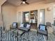 Covered patio with comfortable seating and a view of the home's interior at 14000 N 94Th St # 1008, Scottsdale, AZ 85260