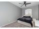 Comfortable bedroom featuring a ceiling fan and a sun-filled window at 17258 W Meghan Dr, Goodyear, AZ 85338