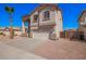 Beautiful house with a two-car garage, desert landscaping and an inviting front entrance at 17258 W Meghan Dr, Goodyear, AZ 85338