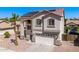 Beautiful two-story home with a two-car garage, desert landscaping, and excellent curb appeal at 17258 W Meghan Dr, Goodyear, AZ 85338