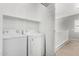 Laundry room with washer and dryer, and a staircase in view at 17258 W Meghan Dr, Goodyear, AZ 85338