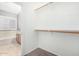 Clean walk-in closet with clothes racks and easy access to bathroom at 17258 W Meghan Dr, Goodyear, AZ 85338