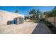 Large backyard with shed, lawn area, and mature trees, perfect for outdoor activities and storage at 1739 E Knox Rd, Tempe, AZ 85284