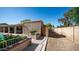 Backyard with pool access, a lush lawn, and a gated walkway, creating a private retreat at 1739 E Knox Rd, Tempe, AZ 85284