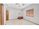 Bright bedroom with a window, a closet, carpeted floors, and neutral walls, offering a versatile space at 1739 E Knox Rd, Tempe, AZ 85284