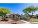 Beautiful single-story home with a well-maintained lawn, mature trees, and desert landscaping at 1739 E Knox Rd, Tempe, AZ 85284