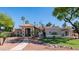 Inviting single-Gathering home featuring a tile roof, stucco exterior, and well-manicured desert landscaping at 1739 E Knox Rd, Tempe, AZ 85284