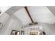 Bright living room featuring vaulted ceilings with wood beams and modern decor with plants and artwork at 1739 E Knox Rd, Tempe, AZ 85284