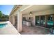 Covered patio with an outdoor bar, ceiling fans, and views of the refreshing swimming pool at 1739 E Knox Rd, Tempe, AZ 85284