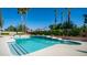 Sparkling pool featuring a diving board and a raised platform with decorative pottery at 1739 E Knox Rd, Tempe, AZ 85284