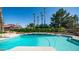 Inviting backyard pool surrounded by mature landscaping, ideal for relaxation and outdoor entertainment at 1739 E Knox Rd, Tempe, AZ 85284