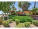 Rancho del Verde community entrance sign with lush landscaping and mature trees at 174 W Del Rio St, Gilbert, AZ 85233