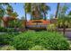Entrance to the Rancho del Verde community, surrounded by mature trees and landscaping at 174 W Del Rio St, Gilbert, AZ 85233