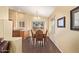 Charming dining area with sliding glass doors and wood-look floors at 174 W Del Rio St, Gilbert, AZ 85233