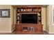 Elegant built-in entertainment center in the living room for media and display at 174 W Del Rio St, Gilbert, AZ 85233