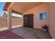 Covered patio featuring tile flooring, a ceiling fan, and a view of the backyard at 174 W Del Rio St, Gilbert, AZ 85233