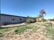 A single story home shows good curb appeal with its well-manicured lawn and classic siding at 17913 E Watford Dr, Queen Creek, AZ 85142