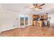 Spacious living room featuring tile floors, a ceiling fan, and access to a deck at 17913 E Watford Dr, Queen Creek, AZ 85142