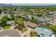 An aerial view showcases the landscaped front yard and a sparkling pool in the backyard at 1817 W Seldon Ln, Phoenix, AZ 85021