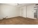 Neutral bedroom with door leading to an adjoining room at 1817 W Seldon Ln, Phoenix, AZ 85021