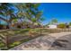 Suburban home with mature tree and a well-kept lawn, showcasing the property's idyllic setting at 1817 W Seldon Ln, Phoenix, AZ 85021