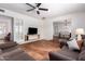 Spacious living room with cozy seating, tile floors, and inviting decor, perfect for relaxing and entertaining at 1817 W Seldon Ln, Phoenix, AZ 85021