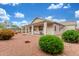 Covered patio and desert landscaping in backyard at 18562 N Alamo Dr, Surprise, AZ 85374