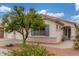 Charming single-Gathering home features a well-maintained yard with a spacious three-car garage at 18562 N Alamo Dr, Surprise, AZ 85374