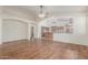 An open-concept living room seamlessly flows into the kitchen area at 18562 N Alamo Dr, Surprise, AZ 85374