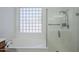 Bathroom with a bathtub and a glass shower at 18617 E Arrowhead Trl, Queen Creek, AZ 85142
