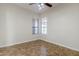 Bedroom with tile flooring and a ceiling fan with lights at 18617 E Arrowhead Trl, Queen Creek, AZ 85142