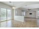 Bright dining room features sliding glass doors and tile flooring with neutral colors at 18617 E Arrowhead Trl, Queen Creek, AZ 85142
