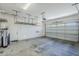 Spacious two car garage with epoxy floor and storage racks at 18617 E Arrowhead Trl, Queen Creek, AZ 85142