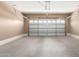 Two car garage providing secure vehicle storage at 18896 N Lariat Rd, Maricopa, AZ 85138