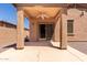 Covered patio with ceiling fan and sliding glass doors at 18896 N Lariat Rd, Maricopa, AZ 85138